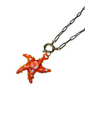 Collar estrella de cristal naranja